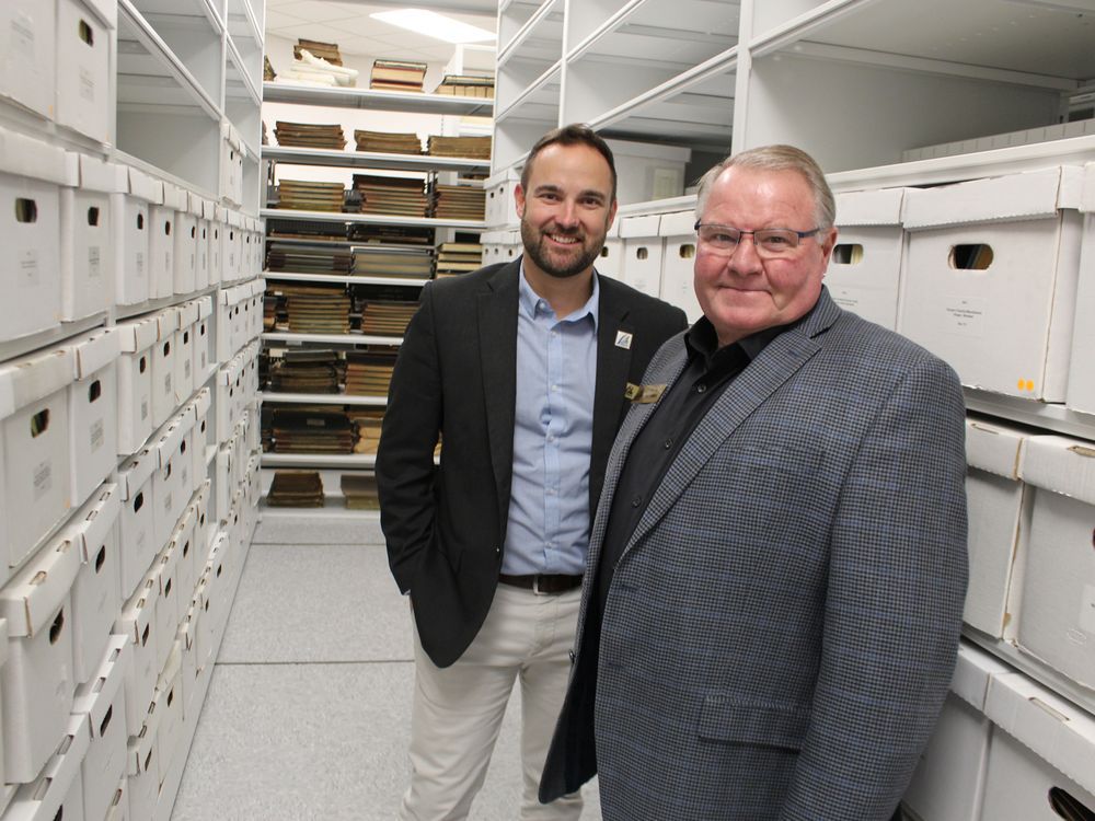 Andrew Meyer, left, general manager of Lambton County's cultural services division, and county Warden Bill Weber