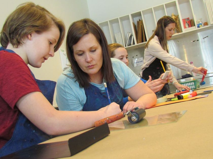 Mother and son doing art activity