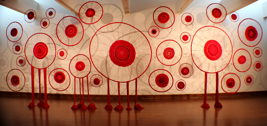 Red crochet string handing in circular design