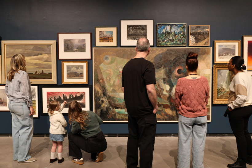Visitors explore the new Storm Watch exhibition at the Judith  Norman Alix Art Gallery