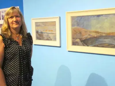 Art Collections Officer, Shelly Mallon with works by Emily Carr