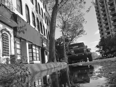 Focus Black and White cityscapes winner. Downtown Sarnia reflected in a rain puddle. Shot in black and white.